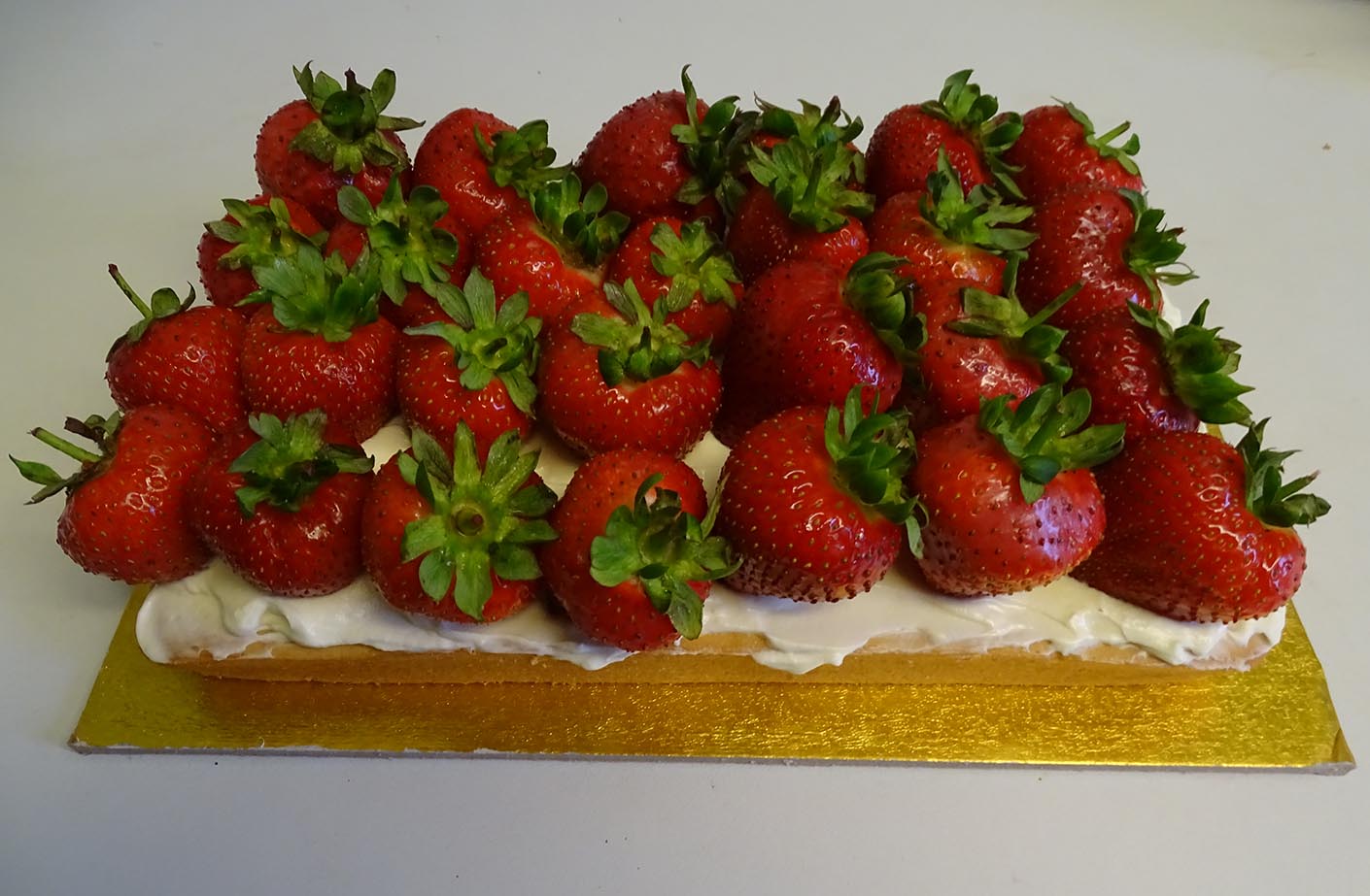 Day 11 of 30 days with Strawberry: Decorate a traybake cake with double cream and fresh Strawberries