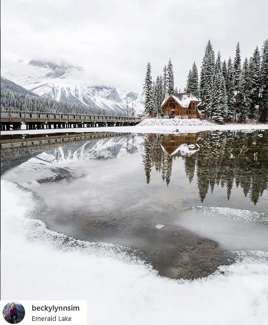 Nature Photography: Nature displays a beautiful snowy landscape in this picture of the Emerald Lake in Canada by Becky Simrose (@beckylynnsim)