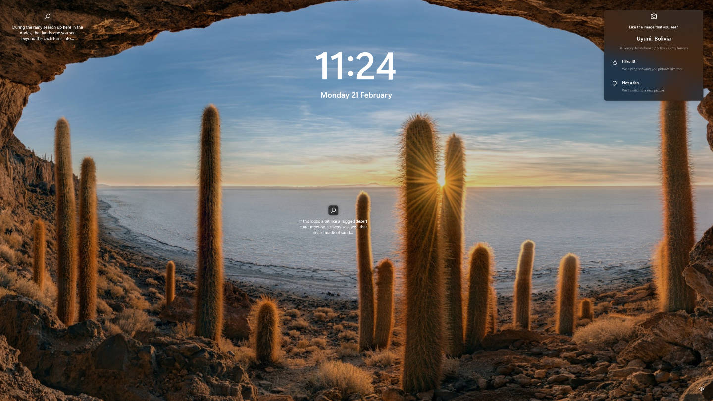 Screensaver / Lock Screen: A view of cactus and salt flats from Isla Incahuasi in Uyuni_ Bolivia in dazzling sunrays on computer lockscreen / screensaver