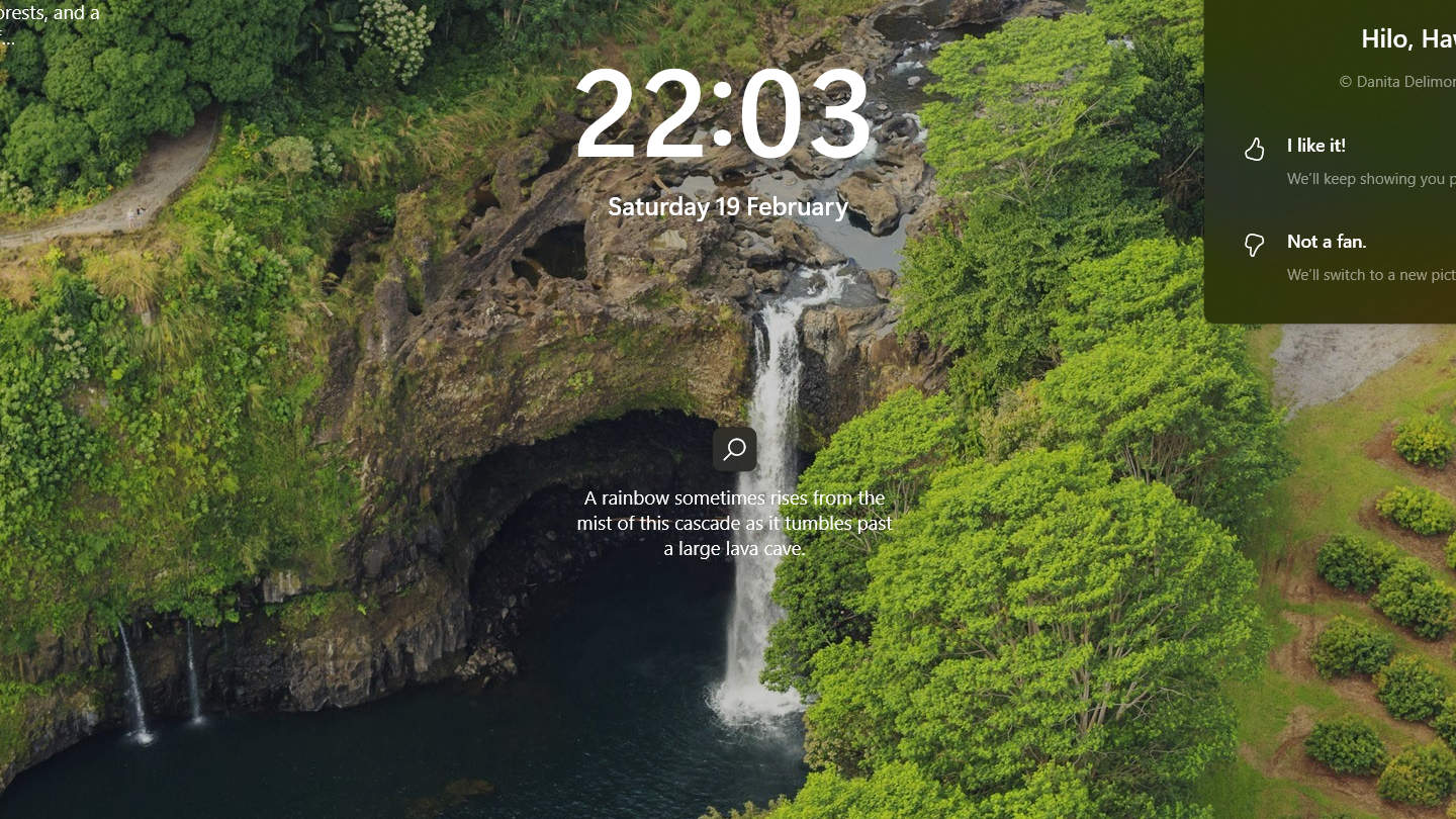 Screensaver / Lock Screen: Aerial view of Rainbow Falls in Wailuku River State Park, Hawaii, USA ‘sashay in legendary grip’ on computer lockscreen / screensaver